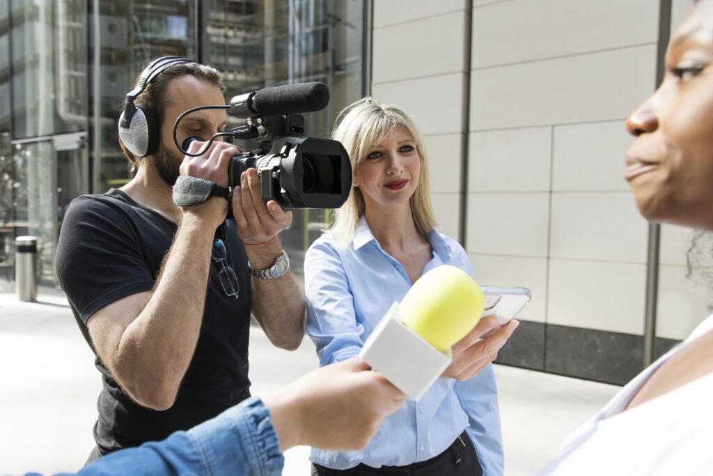 close-up-interviewee-with-microphone-taking-statements