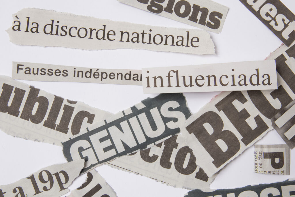 flat-lay-old-newspaper-pieces-assortment